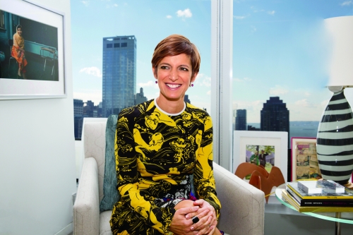 a magazine editor sits in her high-rise NYC office